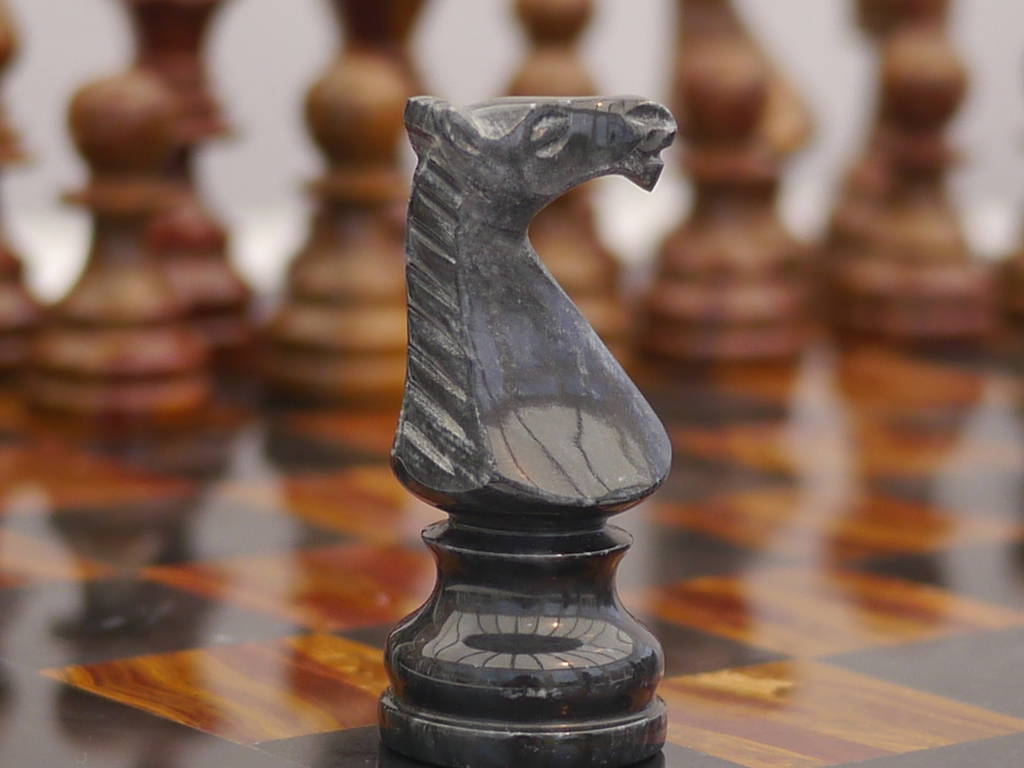 Luxury black leather and marble chess set board with roman chessmen