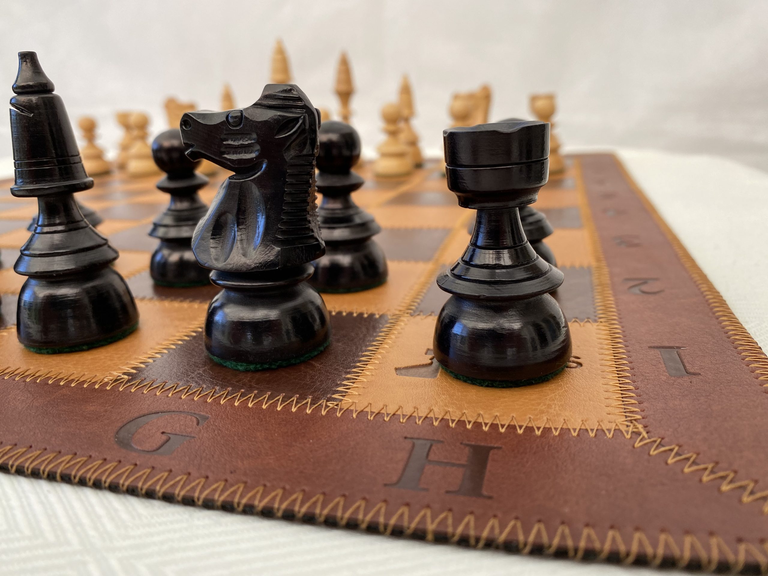Black Leather Chess Mat 2.25 Squares - ChessBaron Chess Sets USA - Call  (213) 325 6540